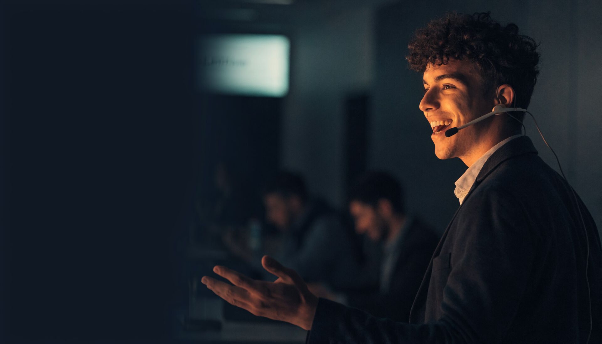 A sales representative with a headset mid-conversation